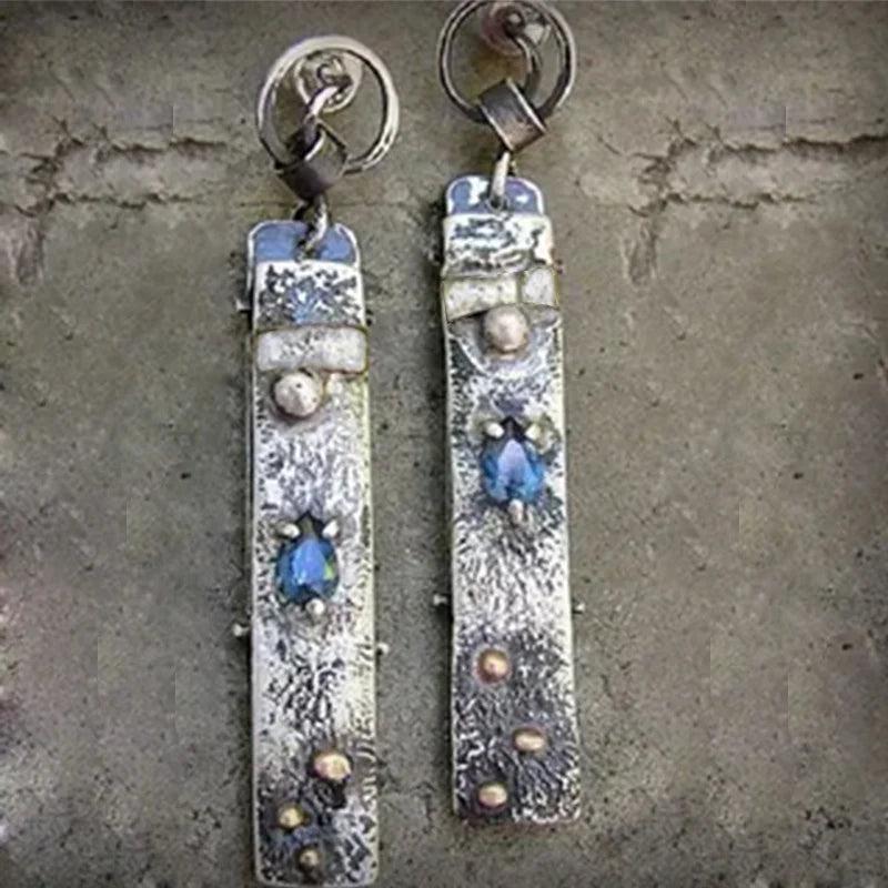 Handcrafted earrings made from blue stone