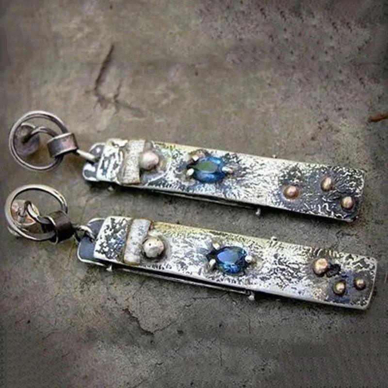 Handcrafted earrings made from blue stone