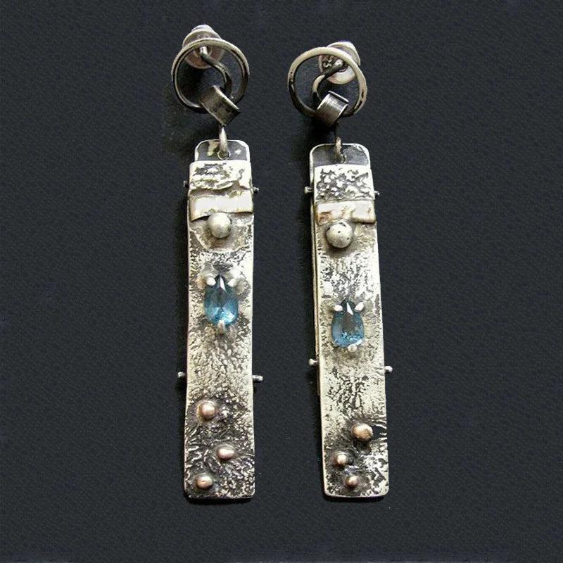 Handcrafted earrings made from blue stone
