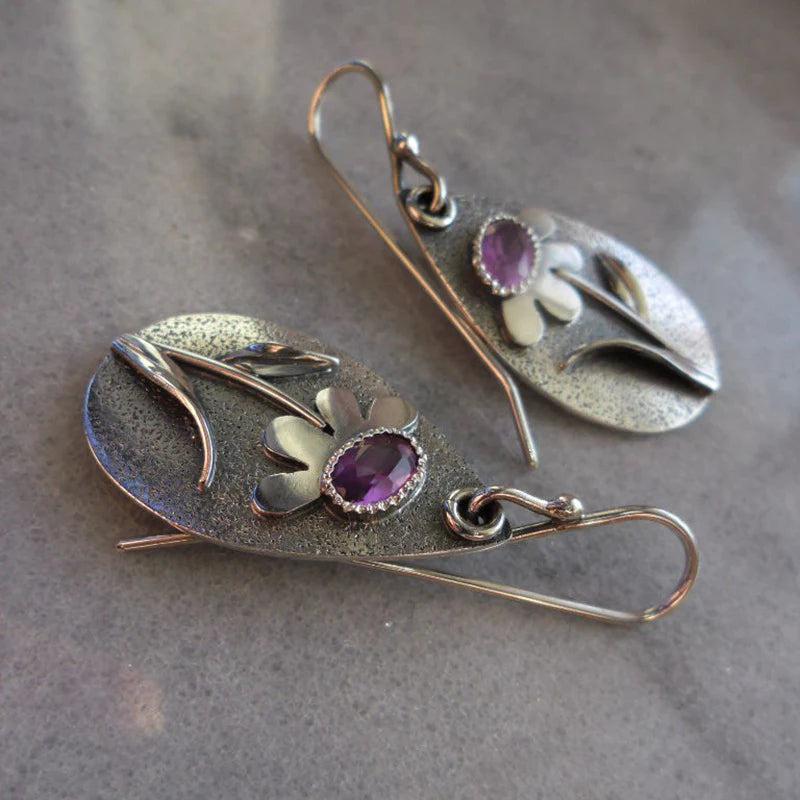 Vintage earrings featuring 3D floral designs