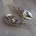 Vintage earrings featuring 3D floral designs