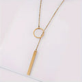 Ethnically inspired alloy circle and bar pendant necklace