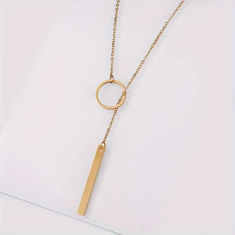 Ethnically inspired alloy circle and bar pendant necklace