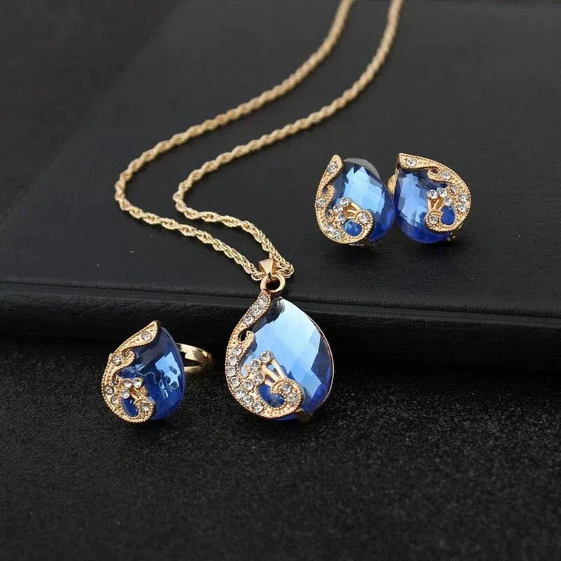 Blue Crystal Necklace and Earring Set in Gold