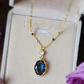 Gold Sapphire Oval Pendant Necklace