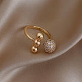Triple Ball Ring crafted from Gold and Cubic Zirconia