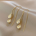 Gold Numeric Earrings