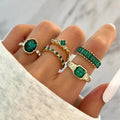 Luxurious rings featuring green zirconias set in gold
