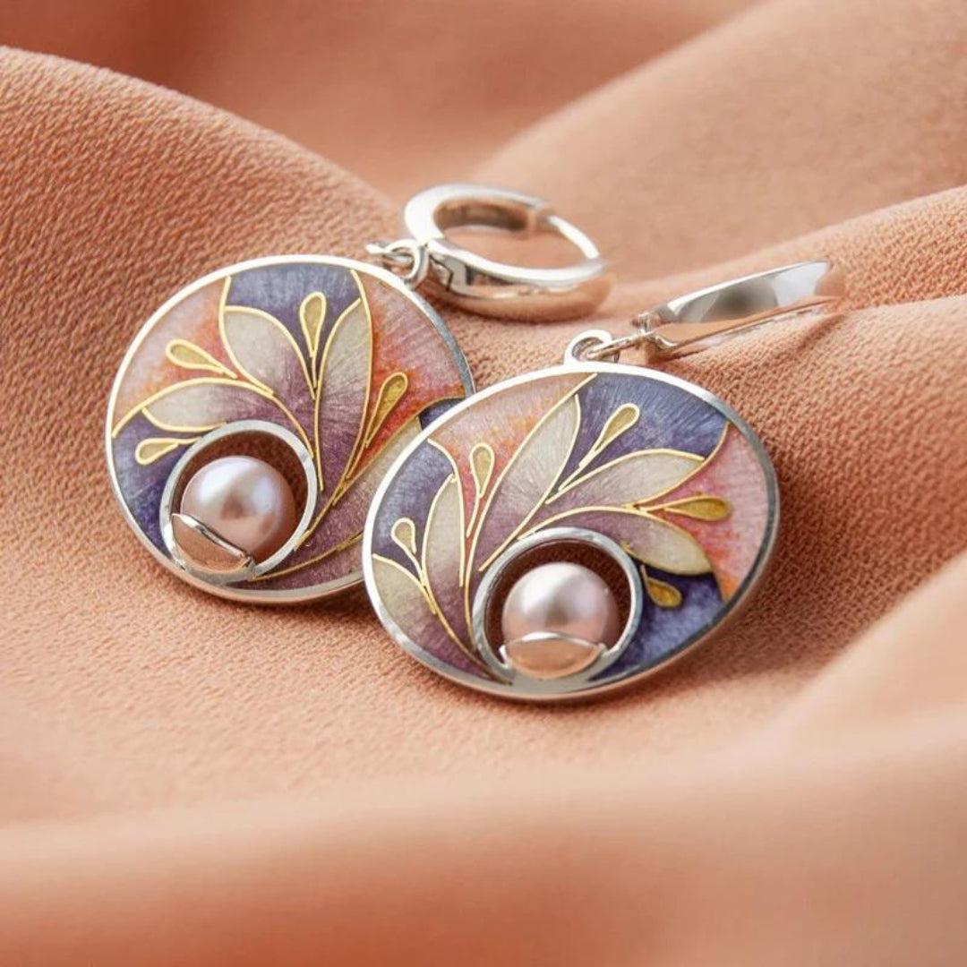 Acrylic earrings adorned with pearls