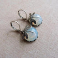Dragonfly earrings featuring white crystals in 925 sterling silver