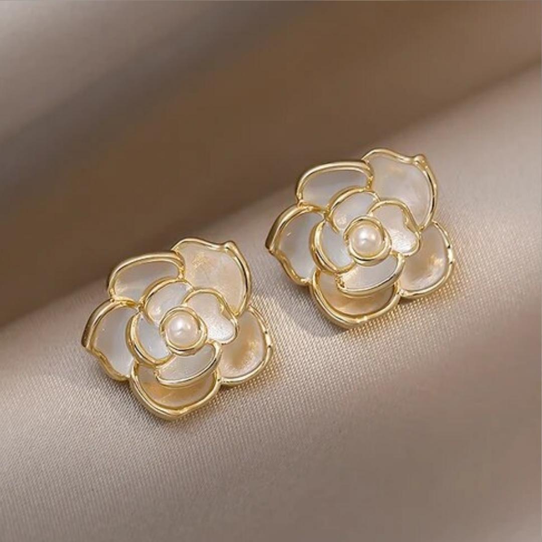 Elegant white floral earrings adorned with pearls