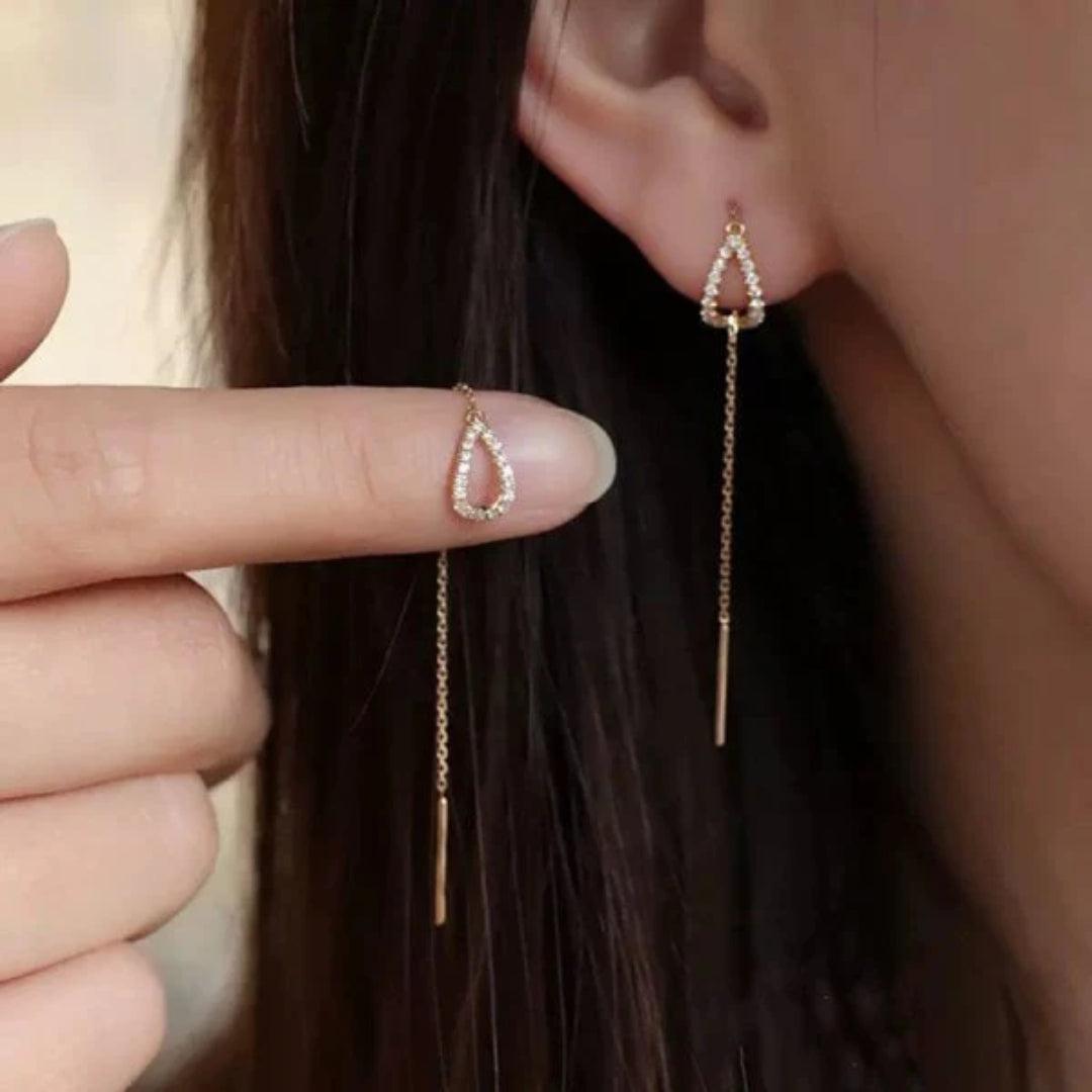 Gleaming dangling earrings
