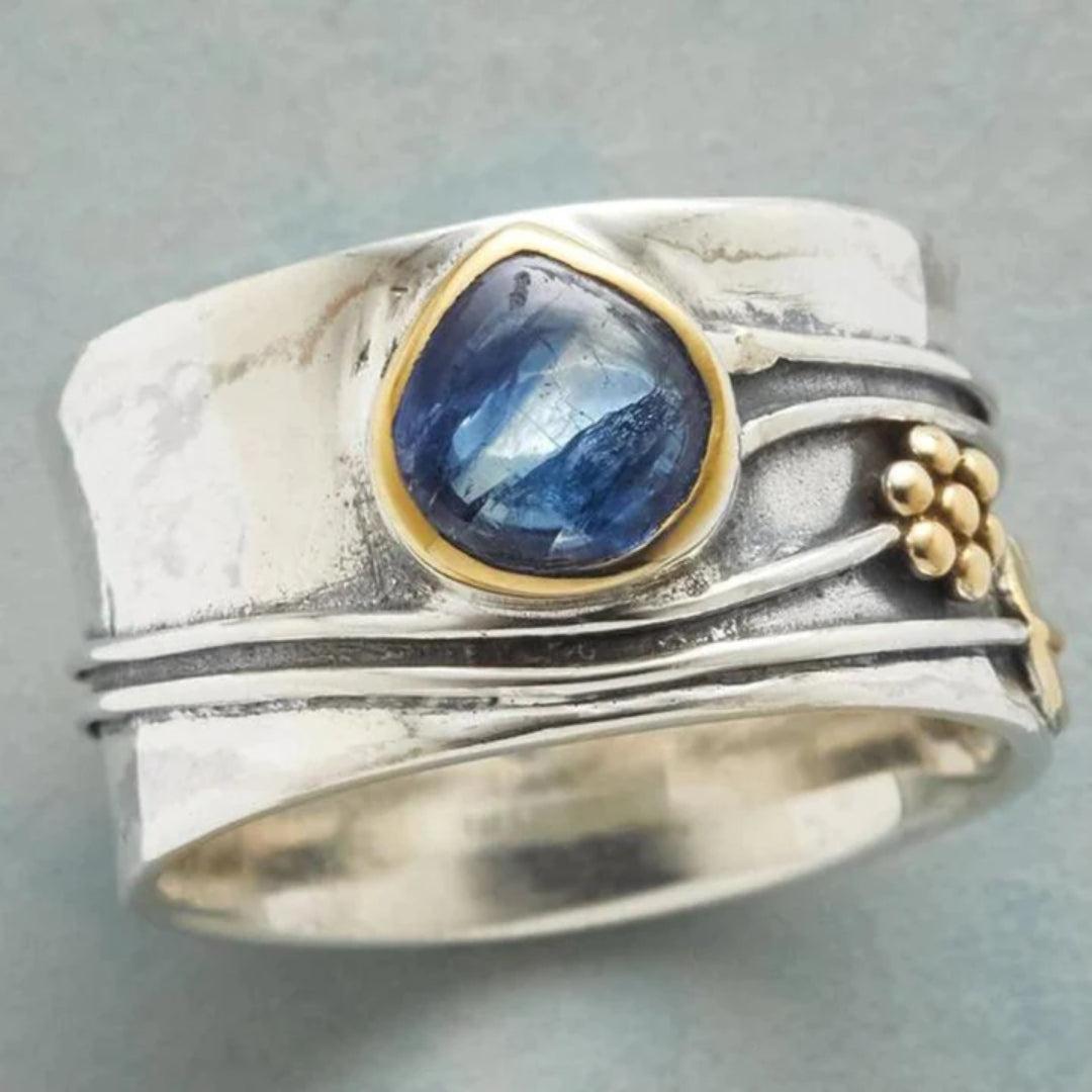Vintage ring featuring a blue gemstone