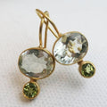 Vintage earrings with green crystal and gilded accents