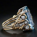 Gold ring featuring a vintage-style blue zircon.