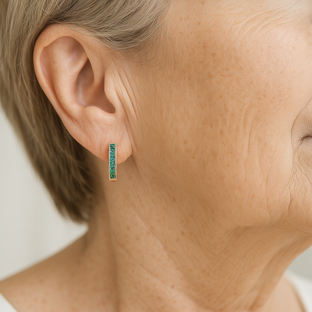 Emerald and diamond earrings set in gold