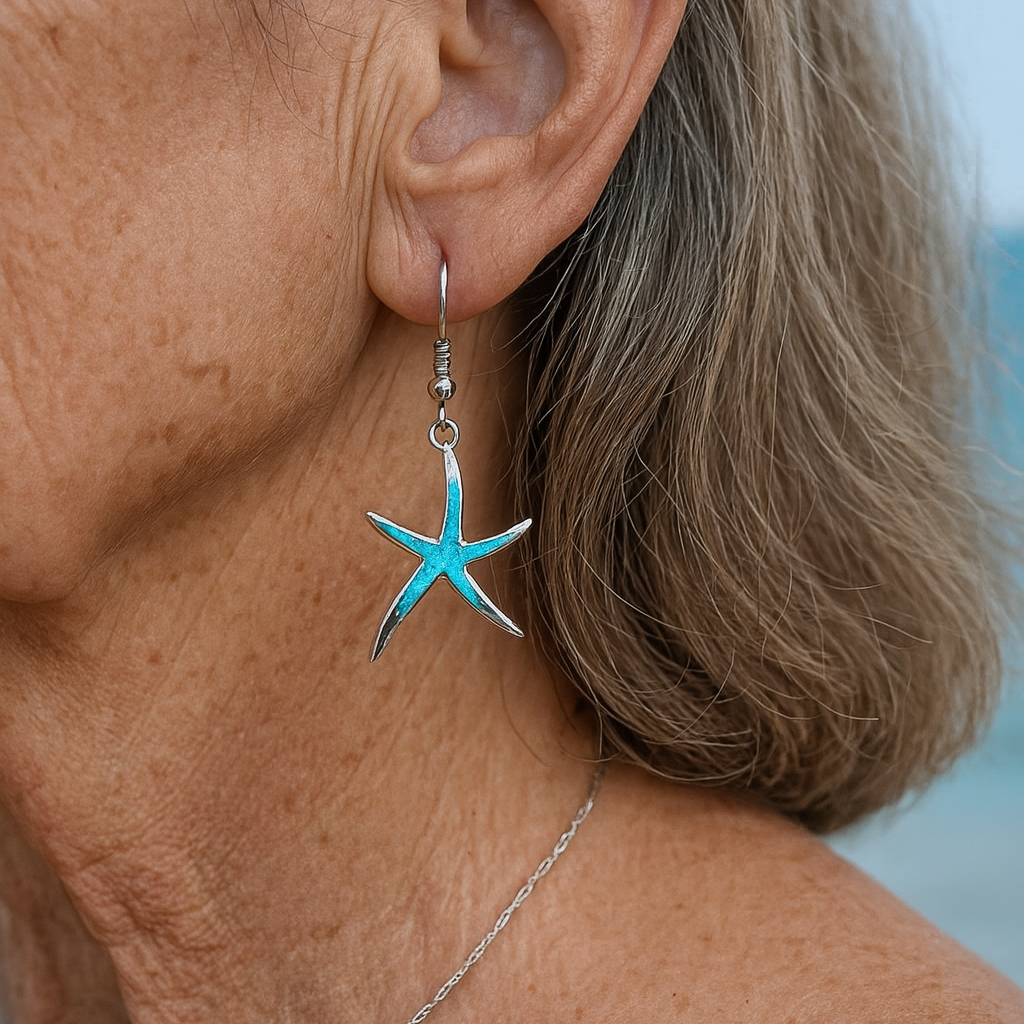 Opal and silver earrings shaped like starfish