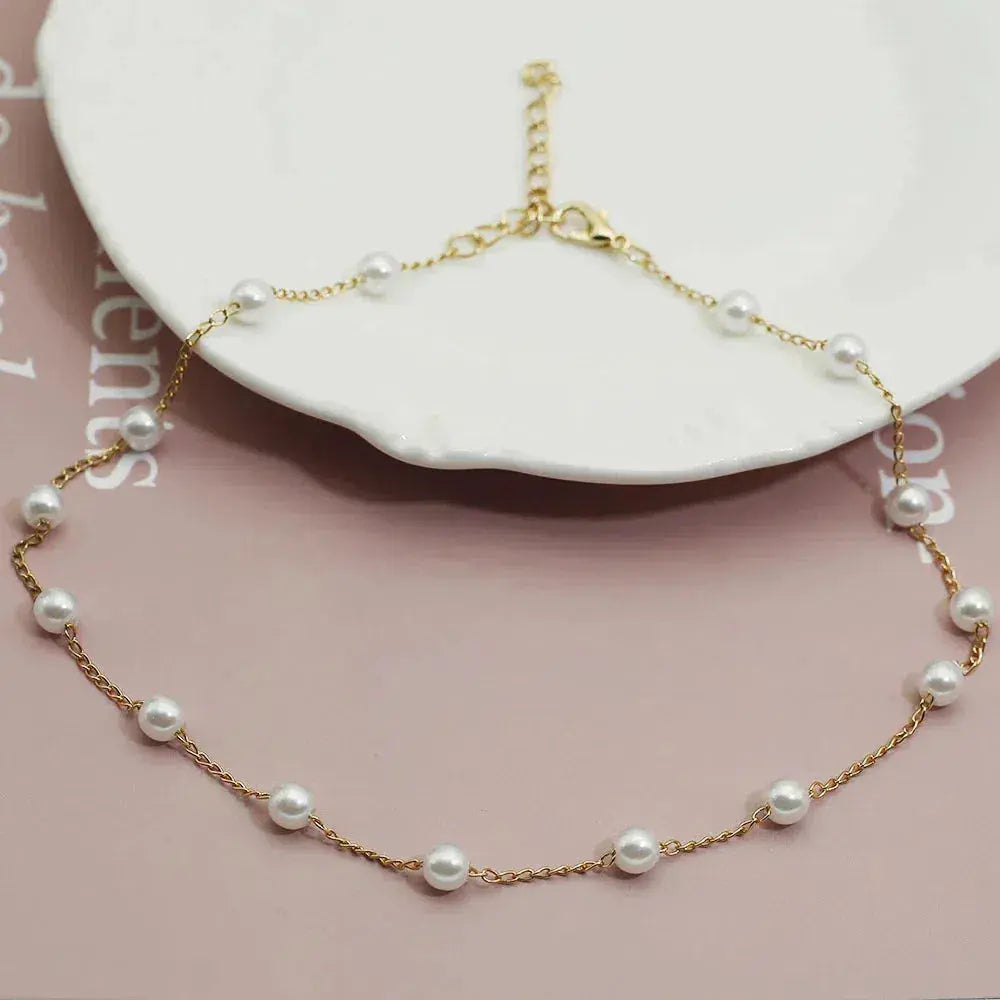 Gold Spaced Pearl Chain Pendant Necklace