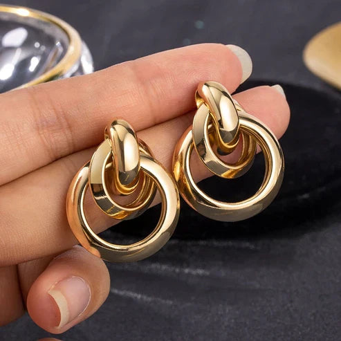 Certainly! Here's a slightly edited version:

**Exquisite Gold Earrings**