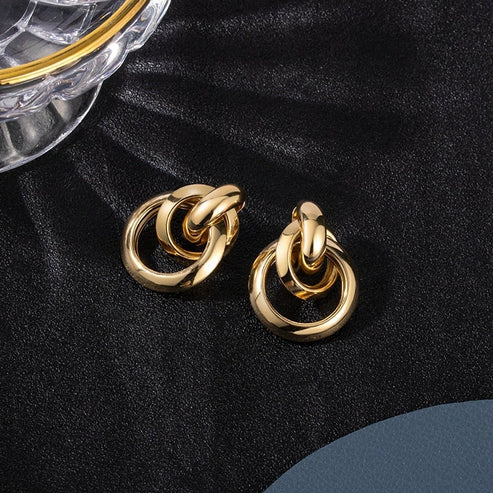 Certainly! Here's a slightly edited version:

**Exquisite Gold Earrings**