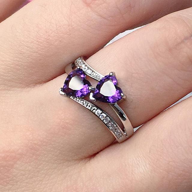 Elegant ring featuring a purple crystal set in silver.