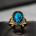 Golden Ring with Blue Sapphire