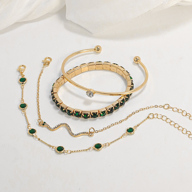 Gold and Emerald Bracelet Collection