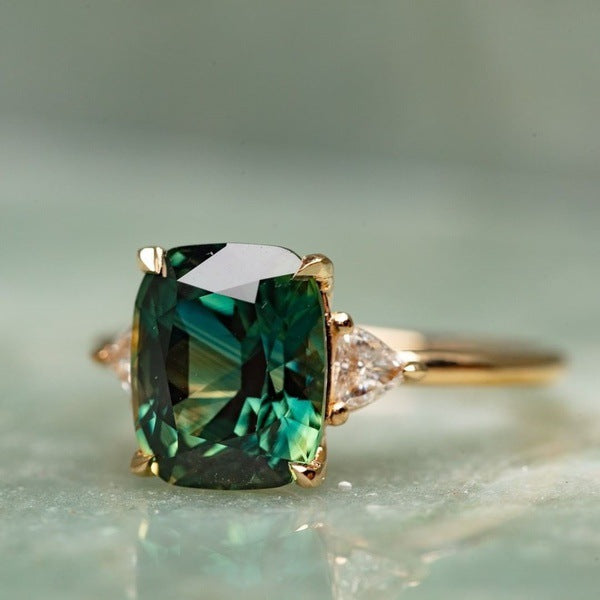 Golden Emerald Solitaire Ring