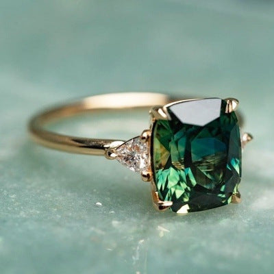 Golden Emerald Solitaire Ring