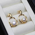 Elegant earrings crafted from gold and pearls