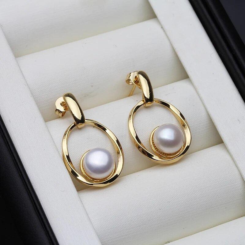 Elegant earrings crafted from gold and pearls
