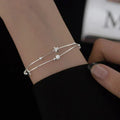 Silver bracelet adorned with stars