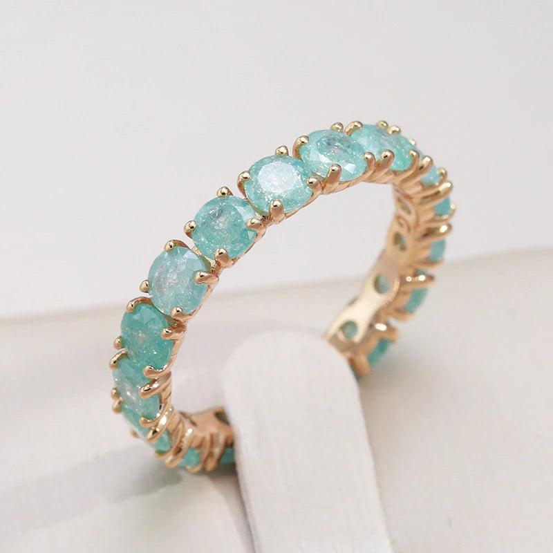 Gold ring with a round stone