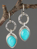 Vintage earrings featuring turquoise inlay