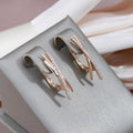 Exquisite Cross Radiant Cross Earrings in Gold
