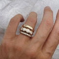 Set of crafted radiant gold rings