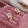 Elegant gold earrings with cubic zirconia