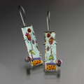 Vintage earrings with antique enamel finish