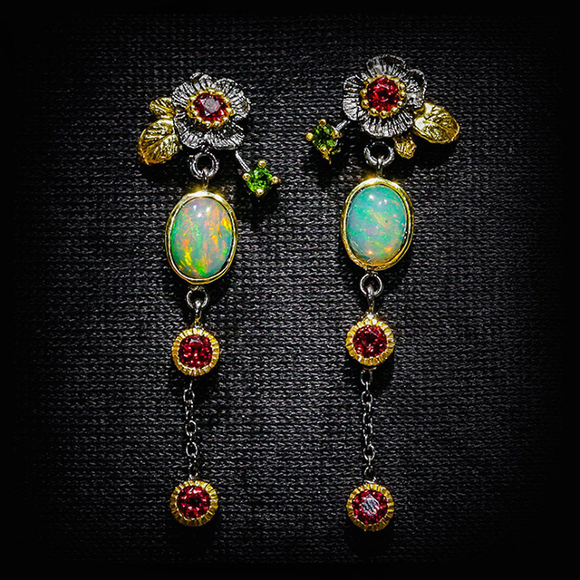 Bohemian earrings featuring opal and red zirconia.