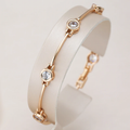 Elegant gold bracelet with zirconias