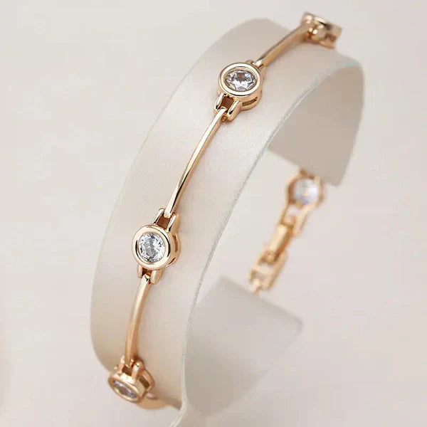 1+1 Offer: Elegant Gold and Crystal Earrings + Sophisticated Bracelet with Zirconias in Gold