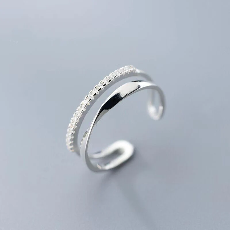 Adjustable silver ring with cubic zirconia stones