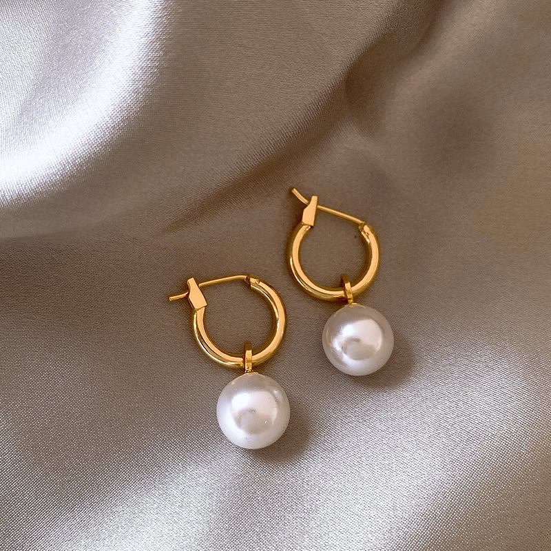 Golden earrings adorned with pearls