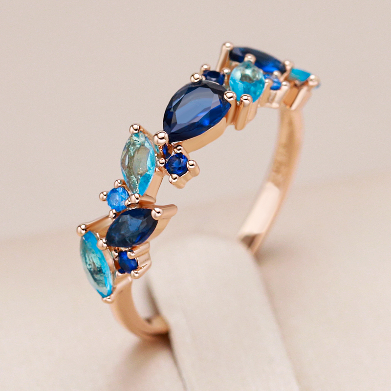 Elegant Gold-Plated Ring with Blue Crystals