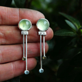 Vintage earrings crafted from green crystal