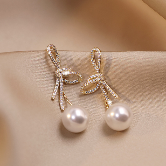 Gold Pearl Earrings with Glossy Bow