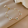 Elegant Daisy Bracelet with Emerald Crystals