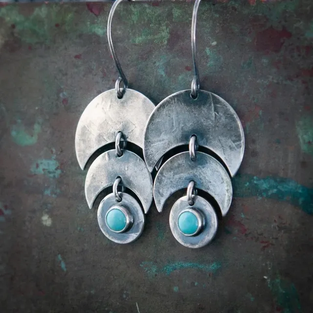 Vintage turquoise earrings set in silver.
