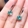 Elegant earrings crafted from turquoise and cubic zirconia.