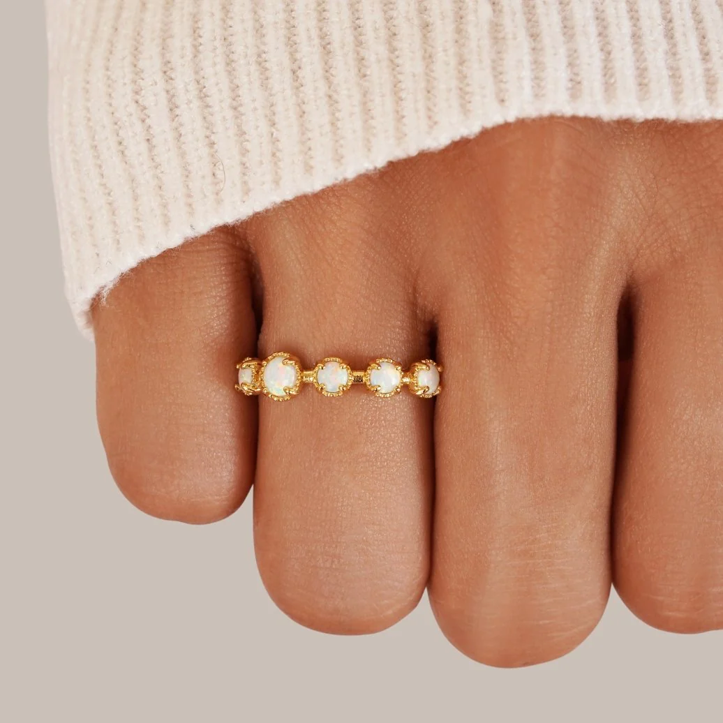 Elegant ring featuring a white opal